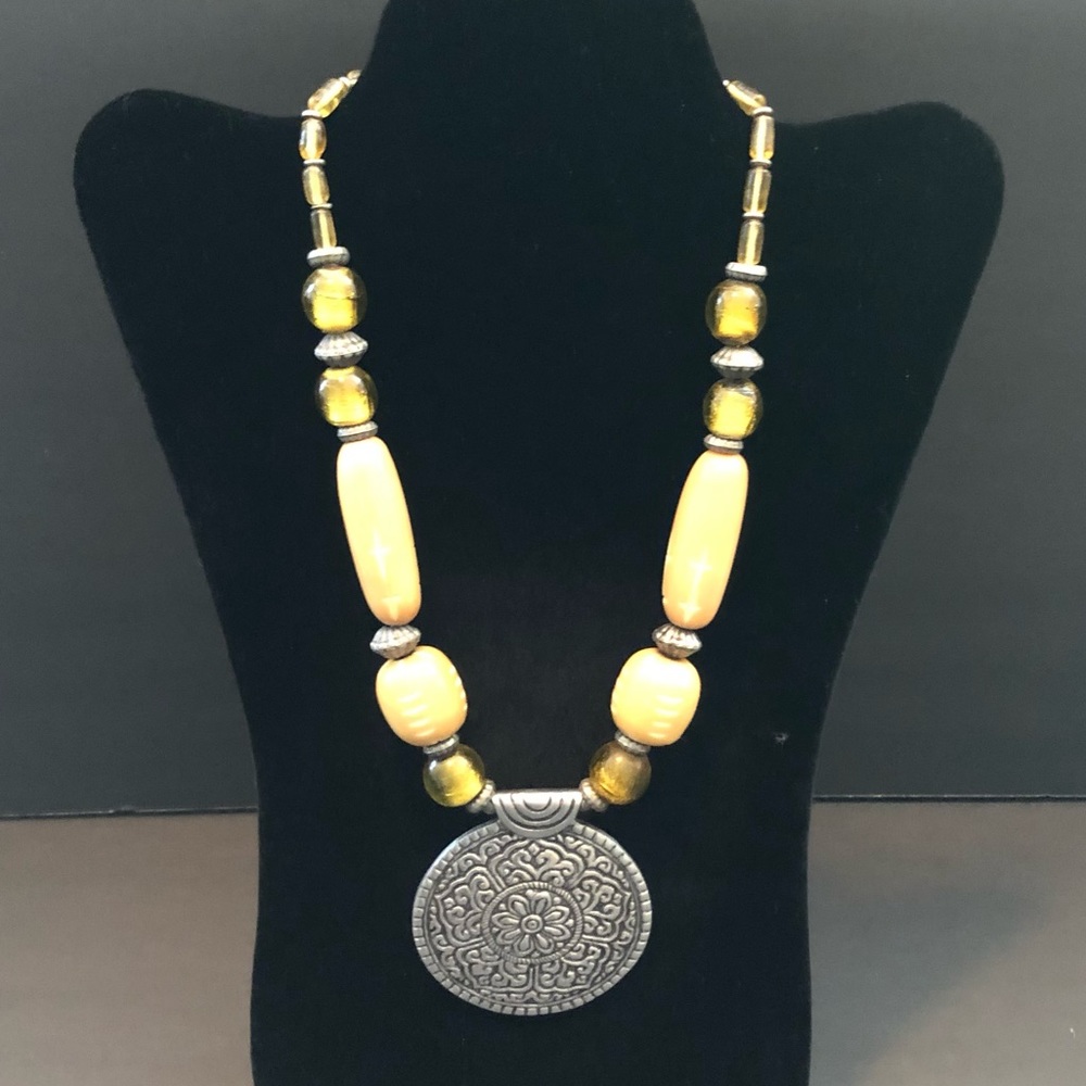 Beautiful ethnic beaded necklace with Center medallion.